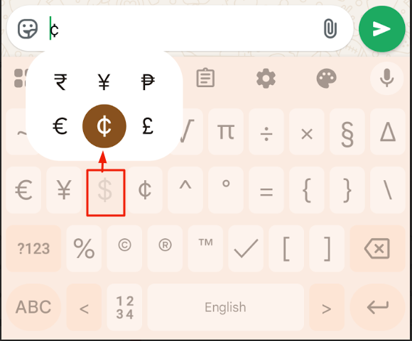 Phone keyboard showing dollar key pressed with popup cent sign option.