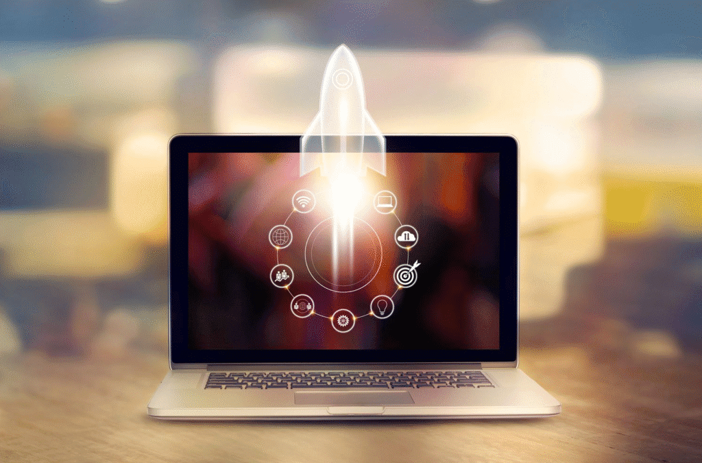 Laptop on a desk with a glowing rocket launch graphic rising from the screen and small performance icons arranged in a circle